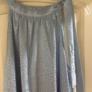 Powder blue large sleeveless top that ties at the top